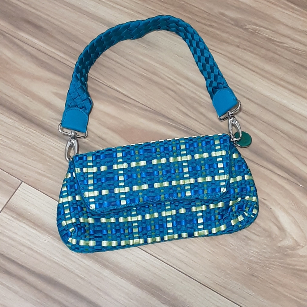 The Sak Y2K multi-color fabric weave design baguette.